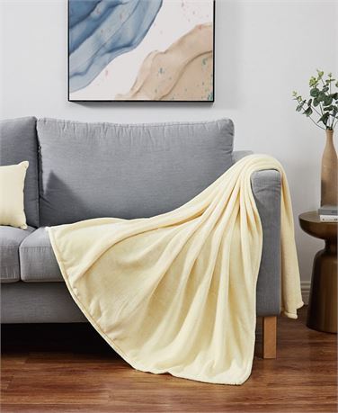 Jeté moelleux uni Cannon 60 x 50 po - jaune