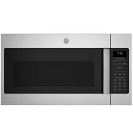 VOIR PHOTOS - Micro-ondes GE 1000 W au-dessus de la cuisinière