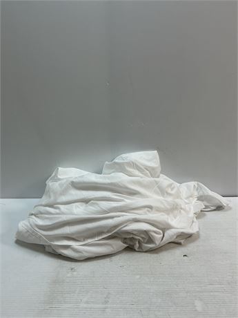 Drap-housse blanc jeté