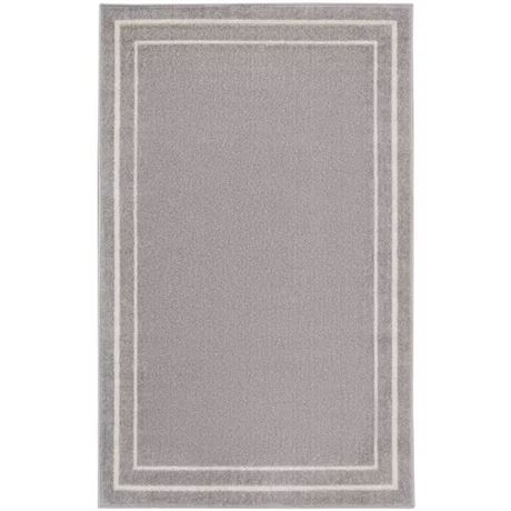 Tapis contemporain uni Nourison Essentials gris/ivoire 2 x 4 pi