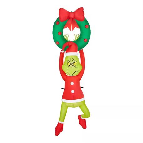Grinch 6,5 pi accroché à une couronne gonflable