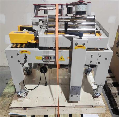 Machine à ruban de boîtes